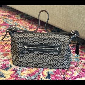 Coach handbag in Black and white.